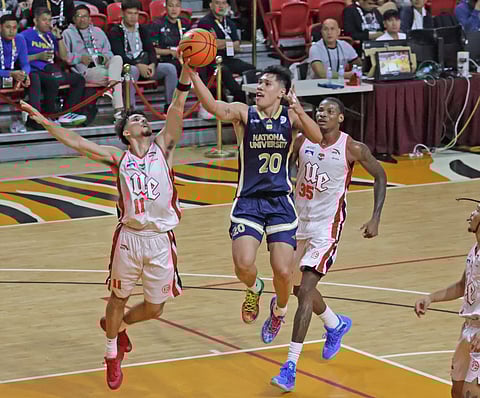 JAKE Figueroa delivers an impressive all-around performance to lift the NU Bulldogs to a 72-57 win over the UE Red Warriors in the UAAP Season 88 men’s basketball tournament yesterday at the UST Quadricentennial Pavilion.