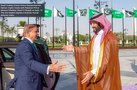 Saudi Arabian Crown Prince Mohammed bin Salman (right) meets with Pakistani Prime Minister Shehbaz Sharif in Riyadh on Sept. 17. The two leaders signed a surprise mutual defense treaty.