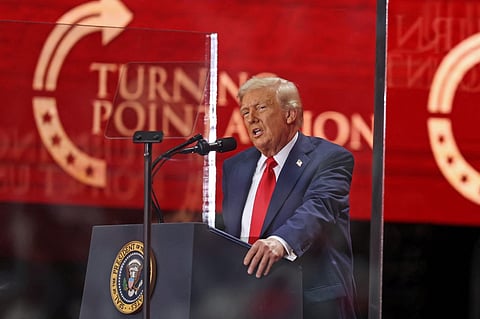 Trump praises conservative 'giant' Kirk at mega memorial event