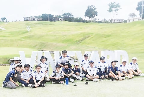 MEMBERS of the Xavier School San Juan pose during the first round of the JGFP Interschool Tournament at The Vineyard Golf Club in Tanauan, Batangas.