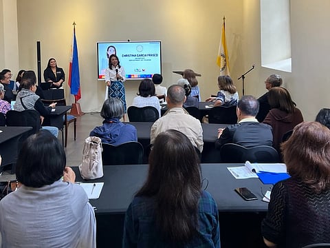 Tourism Secretary Christina Garcia Frasco talks to senior citizens undergoing tour guide training at Centro Turismo de Intramuros in Manila on Wednesday.