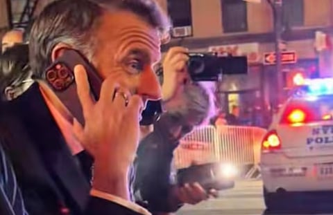 Stuck behind security lockdown, Macron hoofs it in NYC