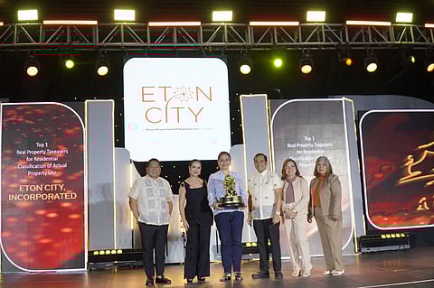 Top 1 Award for ECI:
Receiving the award (third from left) was Atty. Milagros S. Umadhay, AVP for Project Compliance of Eton Properties. With her were (from left to right) Congressman Roy Gonzales, Mayor Arlene B. Arcillas, Vice Mayor Arnold B. Arcilla, City Treasurer Analita Constantino, and City Assessor Cecilia Gabayan.