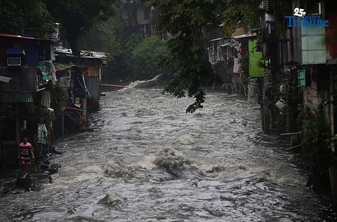 (September 26 2025) Strong current of water due to heavy rains brought by typhoon Opong is seen in Kamias Creek in Quezon City on Friday, September 26, 2025The Metro Manila Disaster Risk Reduction and Management Council urged the public to avoid non-essential travel until over the weekend due to severe weather conditions. Photo/Analy Labor
