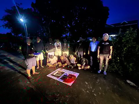 NIGHTFALL ARRESTS | Law enforcement successfully dismantled a drug operation, arresting suspects and confiscating illegal substances under the cover of darkness in Pandi, Bulacan, 25 September. | Franco Regala