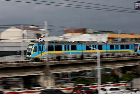 Back on track After nearly a decade in storage, an MRT-3 Dalian train finally rolled again through Quezon City skies.