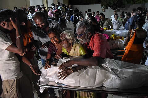 RELATIVES mourn after receiving the dead body of a victim who was killed in a stampede that broke out during a campaign rally last evening in the Karur district, in the Indian state of Tamil Nadu, on 28 September 2025.