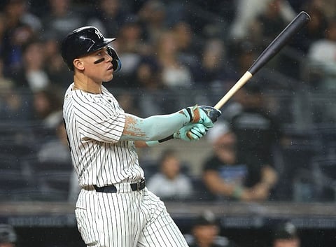 Aaron Judge of the New York Yankees hits a solo home run during the eighth inning against the Chicago White Sox at the Yankee Stadium on September 24, 2025 in the Bronx borough of New York City.