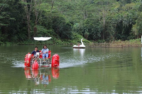Visitors enjoy the view at the Asenso Siloy Man-Made Lake in Barangay Siloy, Calamba, which covers the construction of a 186-meter wakeboarding facility, orientation area, canteen, warehouse and hotel accommodations.