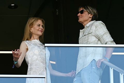 Australian-US actress Nicole Kidman (L) and Australian musician Keith Urban (R) attend the FIFA Club World Cup 2025 Group D football match between US Los Angeles FC and Tunis' Esperance Sportive de Tunis at the Geodis Park stadium in Nashville on June 20, 2025.