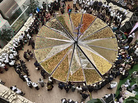 A 28 feet diameter pan of pasta varieties was served by member establishments of the Hotel and Restaurant Association of Baguio (HRAB) at the Atrium of SM City Baguio on October 2, 2025 marking the opening of the 18th Hotel, Restaurant and Tourism (HRT) Month. Photo by Aldwin Quitasol