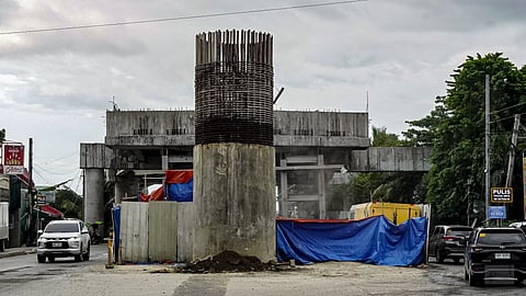 The unfinished Aganan Flyover in Pavia, Iloilo, stands idle after work was suspended in 2022 over concerns of potential displacement, similar to the Ungka Flyover project in the area.