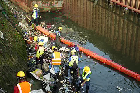 MMDA and QC government conducted joint cleanup operation at Lagarian Creek. Courtesy of MMDA