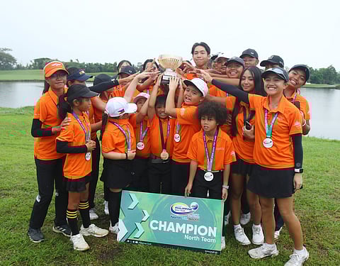 MEMBERS of the North squad celebrate after winning the ICTSI North vs South Elite Junior PGT Championship at The Country Club in Laguna on Friday.