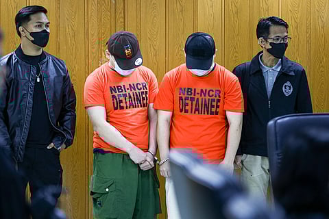 The suspects who were allegedly selling illegal and unregistered vape products are presented by officials from the National Bureau of Investigation at its headquarters.