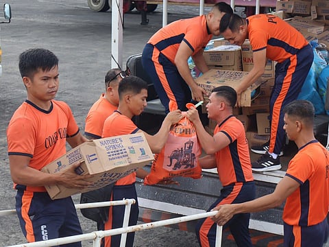 Relief goods from multiple government sectors are loaded onto BRP Corregidor (AE-891) with help from PCG-Western Visayas personnel.