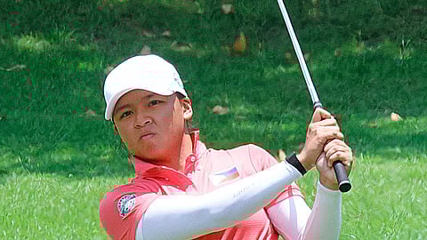 RIANNE Malixi watches her approach during the third round of the 31st Espirito Santo Trophy at Tanah Merah Country Club in Singapore on Friday.