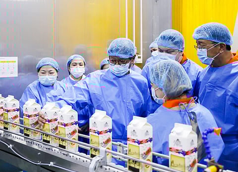 Marcos opens milk plant, seen as dairy boost