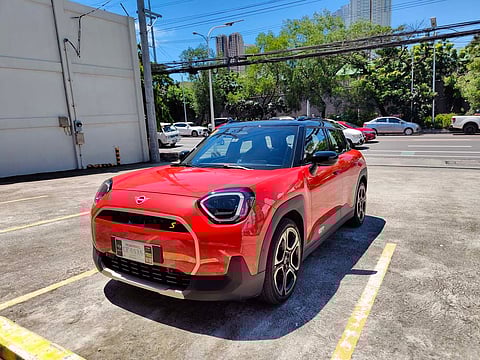 THE Mini Aceman S stands out with its bold red paint and compact crossover stance.