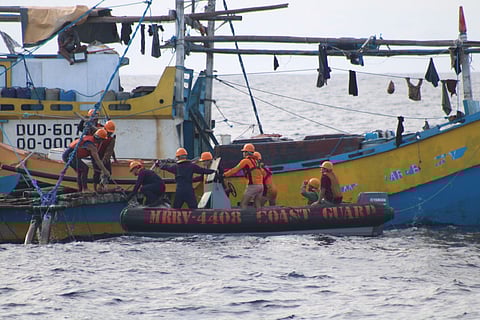 A rigid hull inflatable boat deployed by the PCG’s BRP Cape San Agustin sails beside distressed fishing vessel FV Seriako 1 in the vicinity waters off Bataan on October 5, 2025.