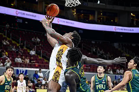 Collins Akowe posts a double-double in UST's 92-80 win over FEU for a share of the top spot in the UAAP Season 88 men's basketball tournament.