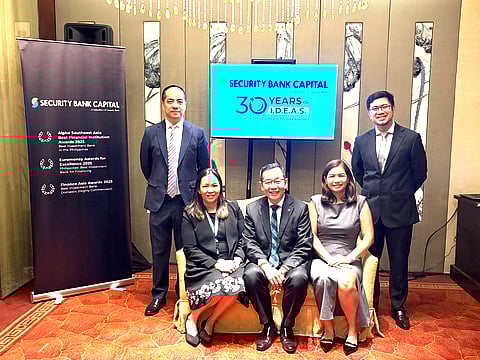 Security Bank Capital executives (from left) Marvin Matias, Coverage and Origination Team head; Daisy Garcia, head of Syndicate and Distribution; Virgilio Chua, president and CEO; Maria Margarita Antoinette Lee, Coverage and Origination Team head; and Daniel James Locsin, Coverage and Origination Team head, beam for the camera as they celebrate their company’s 30th anniversary.