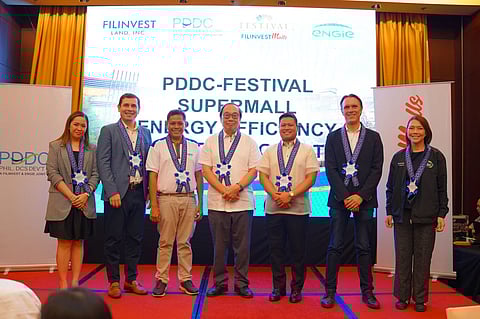 Filinvest Land, PDDC, ENGIE, and Share Pro Inc. executives at the Inauguration of the Festival Mall’s Chilled Water Plant Project.
From L-R: Yvette P. Dizon (General Manager, Festival Mall), Jean-Baptiste Dreanic (Managing Director for Philippines, ENGIE), Michael A. Dumlao (FVP and Retail Business Unit Head, Filinvest Land), Amb. Joseph M. Yap (Chairman, Philippine DCS Development Corp), Jonathan Z. Urbano (General Manager, Philippine DCS Development Corp), Jacques Boonen (Managing Director for Southeast Asia, ENGIE), Cherie B. Fernandez (President, SPI)