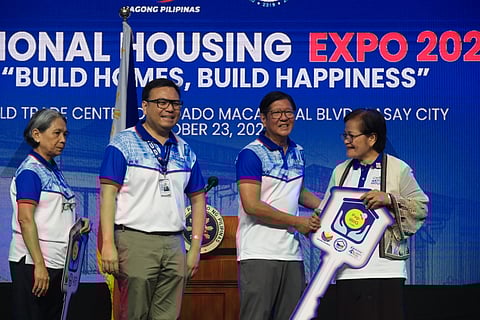 Brick by brick President Ferdinand R. Marcos Jr. (second from right) leads the opening of the National Housing Expo 2025 at the World Trade Center in Pasay City on Thursday, with DHSUD Secretary Jose Ramon Aliling (second from left) and Pag-IBIG Fund CEO Marilene Acosta (left). The Expo showcased innovations that simplify homeownership and strengthen collaboration among key shelter agencies.