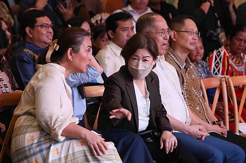 Hearts for heritage Senator Loren Legarda (left) confers with Tessie Sy-Coson, vice chairperson of SM Investments Corp. and chairperson of BDO Unibank (third from left), at the National Arts and Crafts Fair at SM Megamall in Mandaluyong City. A wide range of artisanal and heritage pieces that reflect Filipino culture and craftsmanship from various indigenous communities were showcased. With them are Trade and Industry Secretary Cristina Roque (partly hidden on Legarda’s right), Labor and Employment Secretary Bienvenido Laguesma (immediate right of Sy-Coson) and Technical Education and Skills Development Authority Secretary Kiko Benitez (rightmost).