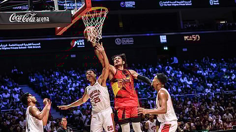 JUNE Mar Fajardo stands tall, powering San Miguel Beer to an 83-81 win over Barangay Ginebra in the PBA 50th Season Philippine Cup on Sunday in Dubai.