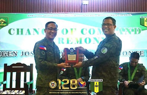 Col. George Begonia INF (left) relinquishes his positin as commander to BGen Ronald Bautista PA (right).