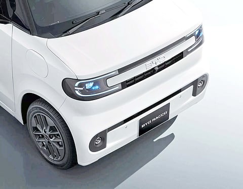 HEADLIGHTS carry a C-shaped LED signature within a closed front fascia.