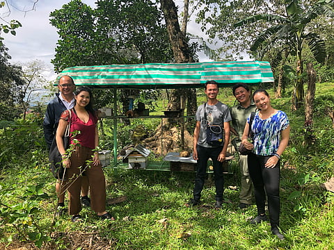 Teresa and her Co-Founder Dana Marquez with their partner beekeepers, wild honey gatherers, and biodiversity officers in Negros.
