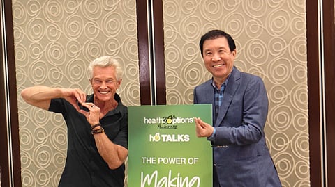 Dr. James Rouse (left) shares wellness insights with Healthy Options CEO Romy Sia (right), emphasizing that true wellness begins with mindful eating and balance, not restriction.