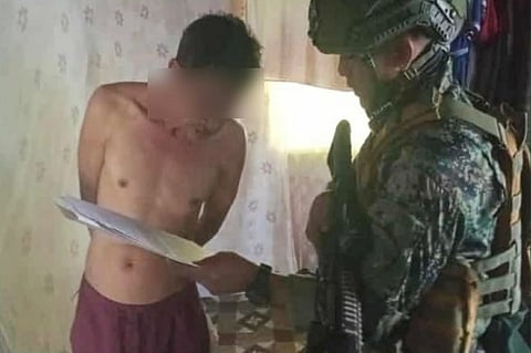 Authorities check on the evidence yielded by the arrested man believed to be a key supporter of the Daulah Islamiyah-Maute Group in Barangay Angandog, Baloi, Lanao del Norte.