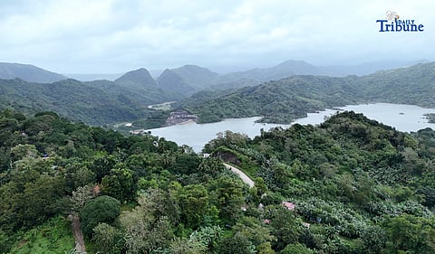 STORM SHIELD. Dark clouds loom over the Sierra Madre mountain range as seen from the Casili River in Barangay Pintong Bukawe, San Mateo, Rizal on Monday, 10 November 2025. According to PAGASA, the rugged terrain of Luzon — including the Sierra Madre — helped weaken Super Typhoon Uwan (Fung-Wong) as it crossed the country’s landmass.