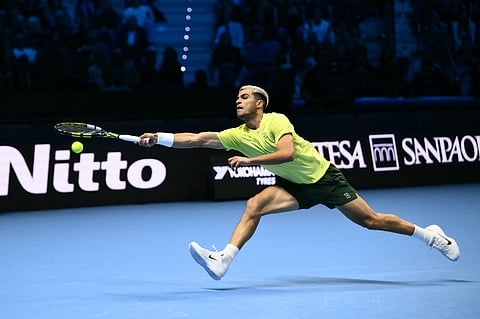CARLOS Alcaraz makes his presence felt, booking a 7-6 (7/5), 6-2 victory over Alex de Minaur in the opening round of the ATP Finals.