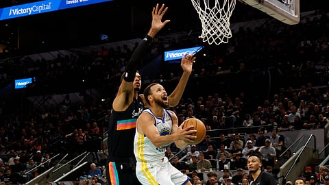 STEPHEN Curry of the Golden State Warriors attacks the defense of Victor Wembanyama of the San Antonio Spurs during their NBA regular season game. The Warriors won, 125-120.