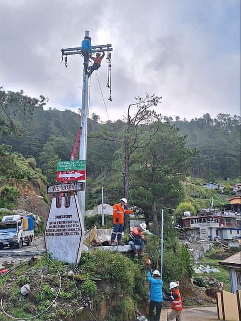 Personnel especially the linemen of the Benguet Electric Cooperative faces difficulties making the restoration works to take possibly about two weeks. |Aldwin Quitasol. Photo Courtesy of Beneco.