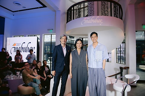 ‘Mabuhay Magazine’ editors in chief Erwin Romulo and Pauline Juan with PAL assistant vice president for Marketing Alvin Miranda.