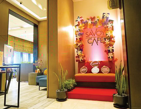 Guests can visit Savoy Café for comforting holiday favorites. Festive Pinoy
parol ornaments brighten Savoy Hotel Manila’s lobby with handcrafted
holiday charm (inset).