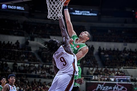 MIKE Phillips delivers a double-double of 21 points and 14 rebounds to lift La Salle past defending champion UP, 87-82, to stay in the UAAP Season 88 men’s basketball tournament Final Four hunt.