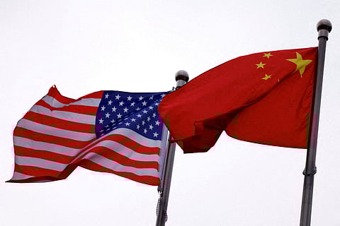 China, U.S. meet as tensions simmer