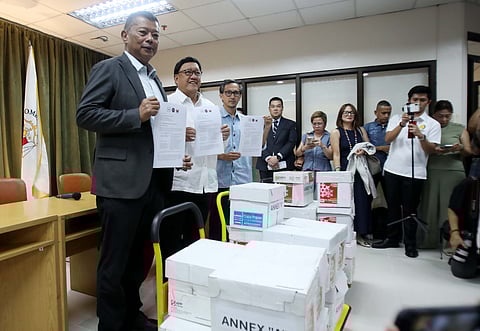More evidence in hand Independent Commission for Infrastructure Chairman Andres Reyes (center) and Department of Public Works and Highways Secretary Vince Dizon (right) turned over more evidence on the alleged flood control anomalies to Ombudsman Jesus Crispin Remulla on Wednesday, 26 November. The ICI and DPWH recommended filing of charges against eight congressmen in connection with the case.