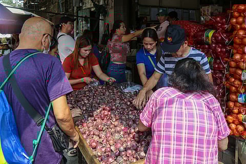 Onions are being sold at a stall inside the Zaragoza Market in Manila.
