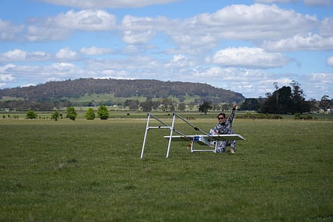 A Philippine Coast Guard Aviation Command (PCG AVCOM) officer participates in a practical demonstration of fixed-wing drone operations in Melbourne, Australia.