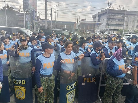 Officers were on standby Sunday as demonstrators gathered to protest alleged national corruption.