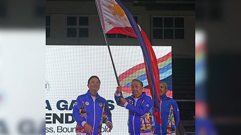 PHILIPPINE Olympic Committee president Abraham ‘Bambol’ Tolentino (right) and Philippine Sports Commission chairman Patrick ‘Pato’ Gregorio dazzle in perked-up, colorful tracksuits during the send-off ceremony for Filipino athletes competing in the 33rd Southeast Asian Games.