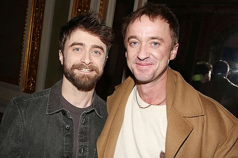 Daniel Radcliffe and Tom Felton pictured together at the Hudson Theatre in New York City on 1 December 2025, marking their first public appearance together in more than a decade.