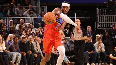 Shai Gilgeous-Alexander powers the Oklahoma City Thunder to a 124-112 win over the Golden State Warriors for their 13th consecutive victory in the NBA regular season.